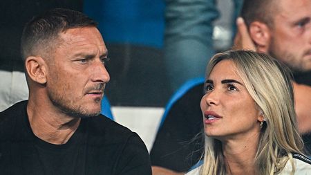 GENOA, ITALY - SEPTEMBER 28: Francesco Totti, former captain of Roma (left), and his girlfriend Noemi Bocchi chat together prior to kick-off in the Serie A TIM match between Genoa CFC and AS Roma at Stadio Luigi Ferraris on September 28, 2023 in Genoa, Italy. (Photo by Simone Arveda/Getty Images)