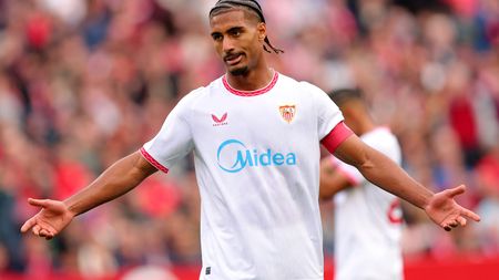 SEVILLE, SPAIN - MARCH 16: Loic Bade of Sevilla FC reacts during the LaLiga match between Sevilla FC and Athletic Club at Estadio Ramon Sanchez Pizjuan on March 16, 2025 in Seville, Spain. (Photo by Fran Santiago/Getty Images) Siviglia