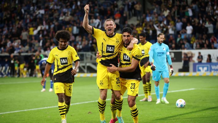 SINSHEIM, GERMANY - SEPTEMBER 29: Julian Ryerson of Borussia Dortmund celebrates his teams third goal past Goalkeeper, Oliver Baumann of TSG Hoffenheim during the Bundesliga match between TSG Hoffenheim and Borussia Dortmund at PreZero-Arena on September 29, 2023 in Sinsheim, Germany. (Photo by Alex Grimm/Getty Images) Borussia Dortmund-Milan: i tedeschi in casa subiscono poco - immagine 1