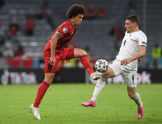 MUNICH, GERMANY - JULY 02: Axel Witsel of Belgium battles for possession with Andrea Belotti of Italy during the UEFA Euro 2020 Championship Quarter-final match between Belgium and Italy at Football Arena Munich on July 02, 2021 in Munich, Germany. (Photo by Christof Stache - Pool/Getty Images)