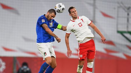 GDANSK, POLAND - OCTOBER 11: Leonardo Bonucci of Italy competes for the ball with Arkadiusz Milik of Poland during the UEFA Nations League group stage match between Poland and Italy at Gdansk Stadium on October 11, 2020 in Gdansk, Poland. (Photo by Claudio Villa/Getty Images)