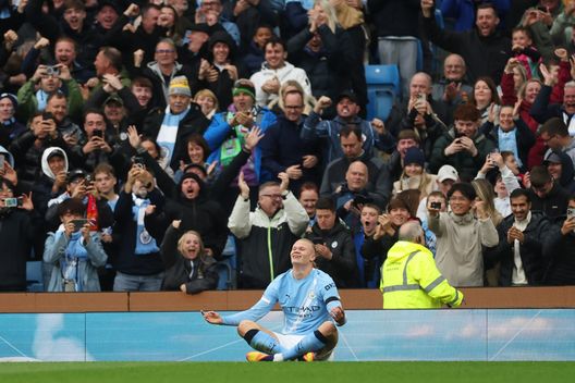 MANCHESTER, ENGLAND - SEPTEMBER 14: Erling Haaland of Manchester City celebrates scoring his team's third goal during the Premier League match between Manchester City and Manchester United at Etihad Stadium on September 14, 2025 in Manchester, England. (Photo by Carl Recine/Getty Images)