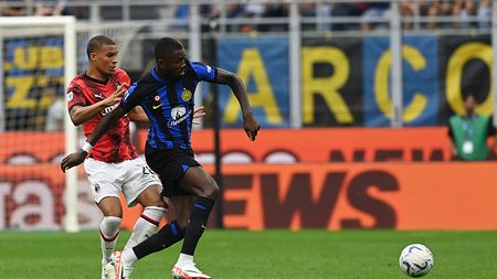MILAN, ITALY - SEPTEMBER 16: Malick Thiaw of AC Milan competes for the ball with Marcus Thuram of FC Internazionale during the Serie A TIM match between FC Internazionale and AC Milan at Stadio Giuseppe Meazza on September 16, 2023 in Milan, Italy. (Photo by Claudio Villa/AC Milan via Getty Images)