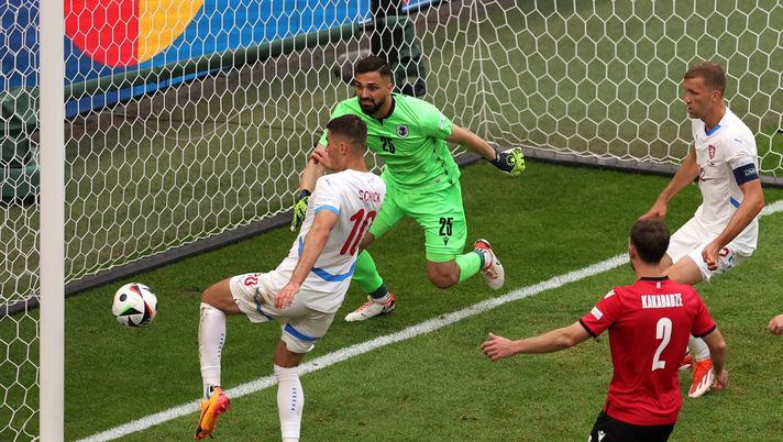 HAMBURG, GERMANY - JUNE 22: Patrik Schick of Czechia scores his team's first goal as Giorgi Mamardashvili of Georgia fails to make a save during the UEFA EURO 2024 group stage match between Georgia and Czechia at Volksparkstadion on June 22, 2024 in Hamburg, Germany. (Photo by Julian Finney/Getty Images) Schick