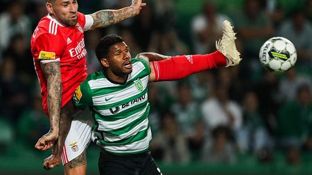 TOPSHOT - Benfica's Argentine defender Nicolas Otamendi (L) vies with Sporting's Brazilian defender Matheus Reis during the Portuguese league football match between Sporting CP and SL Benfica at the Jose Alvalade stadium in Lisbon on May 21, 2023. (Photo by CARLOS COSTA / AFP) (Photo by CARLOS COSTA/AFP via Getty Images)