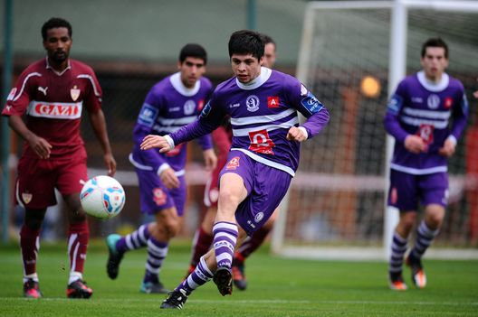 BELEK, TURKEY - JANUARY 08: Rodrigo Rojas of Beerschot runs with the ball during a friendly match between VfB Stuttgart and Germinal Beerschot Antwerpen at Kempinski football field on January 8, 2012 in Belek, Turkey. (Photo by Lars Baron/Bongarts/Getty Images)