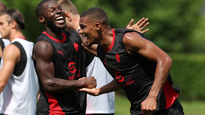 CAIRATE, ITALY - JULY 15: Malick Thiaw and Yunus Musah celebrate during at AC Milan training session at Milanello sports center at Milanello on July 15, 2025 in Cairate, Italy. (Photo by Claudio Villa/AC Milan via Getty Images) Thiaw Musah