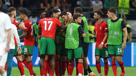 FRANKFURT AM MAIN, GERMANY - JULY 01: Cristiano Ronaldo of Portugal looks dejected as he is consoled by teammates ahead of the second half of extra-time during the UEFA EURO 2024 round of 16 match between Portugal and Slovenia at Frankfurt Arena on July 01, 2024 in Frankfurt am Main, Germany. (Photo by Lars Baron/Getty Images)