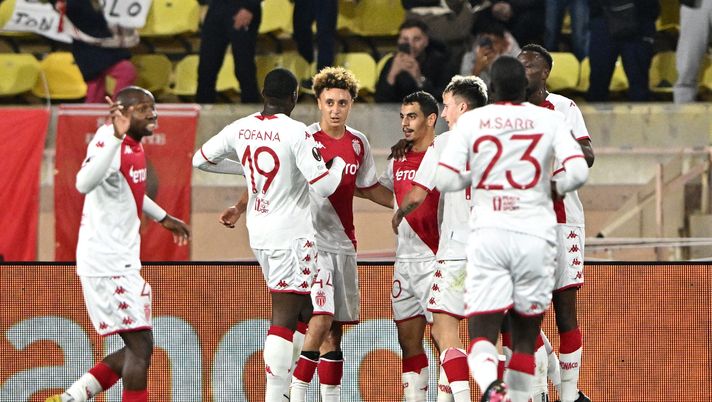MONACO, MONACO - FEBRUARY 23: Wissam Ben Yedder of AS Monaco celebrates with teammates after scoring the team's first goal from a penalty kick during the UEFA Europa League knockout round play-off leg two match between AS Monaco and Bayer 04 Leverkusen at Stade Louis II on February 23, 2023 in Monaco, Monaco. (Photo by Chris Ricco/Getty Images) Monaco