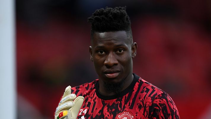MANCHESTER, ENGLAND - AUGUST 14: André Onana of Manchester United warms up ahead of the Premier League match between Manchester United and Wolverhampton Wanderers at Old Trafford on August 14, 2023 in Manchester, England. (Photo by Gareth Copley/Getty Images)  Manchester United Chelsea