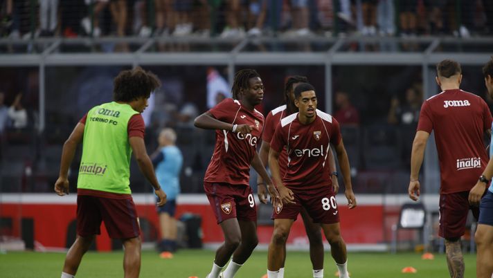 MILAN, ITALY - AUGUST 17: Come Bianay Balcot and Eybi Alieu Njie of Torino FC looks on prior to the Serie A match between AC Milan and Torino at Stadio Giuseppe Meazza on August 17, 2024 in Milan, Italy. Photo by: Nderim Kaceli Verona-Toro 2-3, Njie: “Sono pronto a lavorare e ad aiutare più che posso” - immagine 1