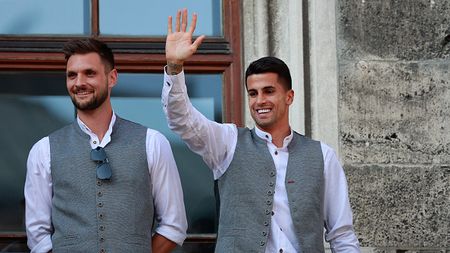 MUNICH, GERMANY - MAY 28: João Cancelo celebrates during the official championship celebration at Marienplatz on May 28, 2023 in Munich, Germany. (Photo by Nathan Zentveld/Getty Images)