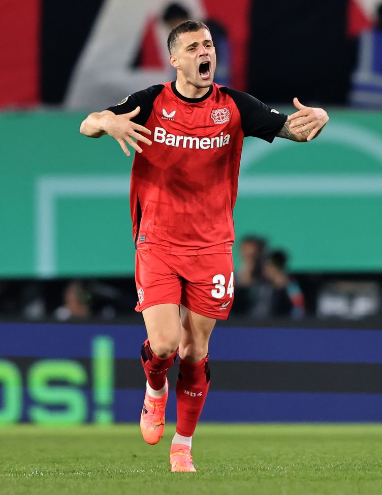 BIELEFELD, GERMANY - APRIL 01: Granit Xhaka of Bayer 04 Leverkusen reacts during the DFB Cup Semi Final between DSC Arminia Bielefeld and Bayer 04 Leverkusen at Schueco Arena on April 01, 2025 in Bielefeld, Germany. (Photo by Christof Koepsel/Getty Images) Milan Xhaka