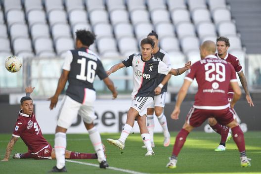 TURIN, ITALY - JULY 04: Paulo Dybala (C) of Juventus scores the opening goal during the Serie A match between Juventus and Torino FC at Allianz Stadium on July 4, 2020 in Turin, Italy. (Photo by Valerio Pennicino/Getty Images)