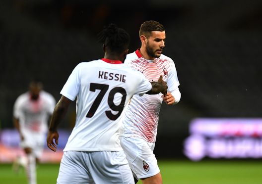 TURIN, ITALY - MAY 12: Theo Hernandez of A.C. Milan celebrates with Franck Kessie after scoring their side's first goal during the Serie A match between Torino FC and AC Milan at Stadio Olimpico di Torino on May 12, 2021 in Turin, Italy. Sporting stadiums around Italy remain under strict restrictions due to the Coronavirus Pandemic as Government social distancing laws prohibit fans inside venues resulting in games being played behind closed doors. (Photo by Valerio Pennicino/Getty Images)