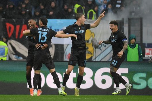 ROME, ITALY - JANUARY 04: Amir Rrahmani of SSC Napoli celebrates after scoring his team's second goal with his teammates during the Serie A match between SS Lazio and SSC Napoli at Stadio Olimpico on January 04, 2026 in Rome, Italy. (Photo by Marco Rosi - SS Lazio/Getty Images)