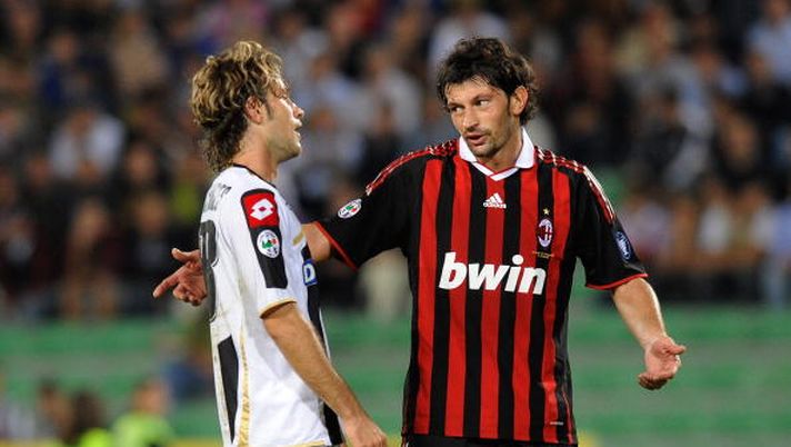 UDINE, ITALY - SEPTEMBER 23: (L to R) Antonio Floro Flores of Udinese arguing with Kakha Kaladze of AC Milan during the serie A match between Udinese Calcio and AC Milan at Stadio Friuli on September 23, 2009 in Udine, Italy. (Photo by Dino Panato/Getty Images) kaladze-storia-milan-gol-2001-udinese