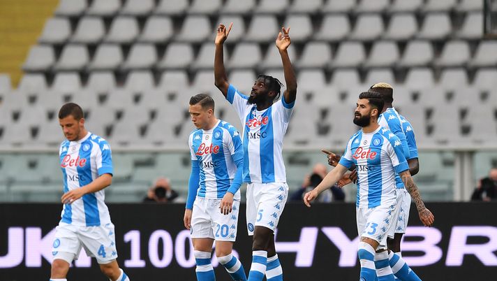TURIN, ITALY - APRIL 26: Tiemoue Bakayoko of SSC Napoli celebrates with teammates after scoring their team's first goal during the Serie A match between Torino FC and SSC Napoli at Stadio Olimpico di Torino on April 26, 2021 in Turin, Italy. Sporting stadiums around Italy remain under strict restrictions due to the Coronavirus Pandemic as Government social distancing laws prohibit fans inside venues resulting in games being played behind closed doors. (Photo by Valerio Pennicino/Getty Images) bakayoko