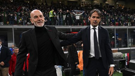 MILAN, ITALY - APRIL 19: Head coach of AC Milan Stefano Pioli
shakes hands with head coach of FC Internazionale Simone Inzaghi before the Coppa Italia Semi Final 2nd Leg match between FC Internazionale v AC Milan at Giuseppe Meazza Stadium on April 19, 2022 in Milan, Italy. (Photo by Claudio Villa/AC Milan via Getty Images)