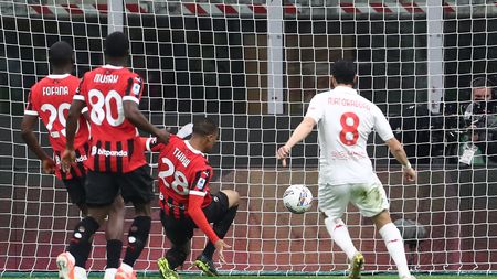 MILAN, ITALY - APRIL 05: Malick Thiaw of AC Milan concedes an own goal, resulting in the first goal for Fiorentina, during the Serie A match between AC Milan and Fiorentina at Stadio Giuseppe Meazza on April 05, 2025 in Milan, Italy. (Photo by Marco Luzzani/Getty Images)