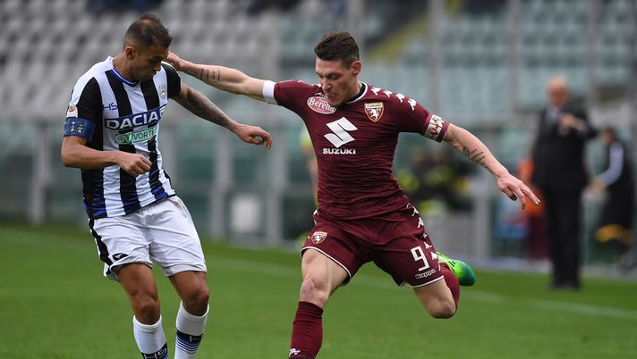 TURIN, ITALY - APRIL 02: Andrea Belotti (R) of FC Torino is challenged by Larangeira Danilo of Udinese Calcio during the Serie A match between FC Torino and Udinese Calcio at Stadio Olimpico di Torino on April 2, 2017 in Turin, Italy. (Photo by Valerio Pennicino/Getty Images) Le pagelle di Torino-Udinese 2-2: Belotti incarna il Toro, Ljajic in fascia non rende- immagine 1