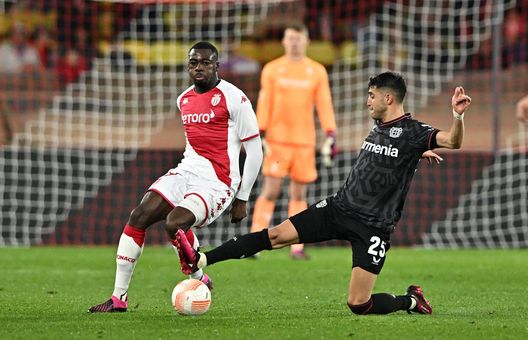 MONACO, MONACO - FEBRUARY 23: Youssouf Fofana of AS Monaco challenged by Exequiel Palacios of Bayer 04 Leverkusen during the UEFA Europa League knockout round play-off leg two match between AS Monaco and Bayer 04 Leverkusen at Stade Louis II on February 23, 2023 in Monaco, Monaco. (Photo by Chris Ricco/Getty Images)