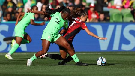 MELBOURNE, AUSTRALIA - JULY 21: Julia Grosso of Canada and Michelle Alozie of Nigeria compete for the ball during the FIFA Women's World Cup Australia & New Zealand 2023 Group B match between Nigeria and Canada at Melbourne Rectangular Stadium on July 21, 2023 in Melbourne, Australia. (Photo by Robert Cianflone/Getty Images)