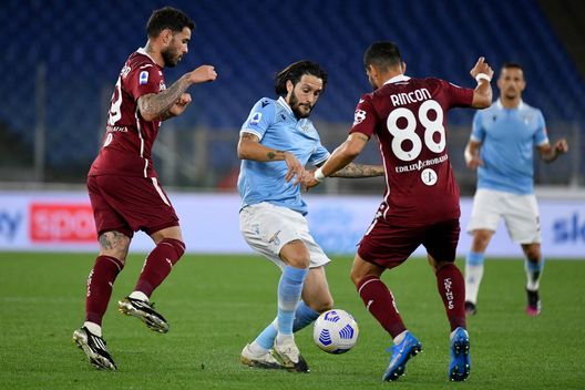 ROME, ITALY - MAY 18: Luis Alberto of SS Lazio competes for the ball with Tomas Rincon of Torino FC during the Serie A match between SS Lazio and Torino FC at Stadio Olimpico on May 18, 2021 in Rome, Italy. The match, despite it's not postponed by Lega Serie A, will not be played as Torino team need to observe a home quarantine until midnight on Tuesday due to Covd-19. (Photo by Marco Rosi - SS Lazio/Getty Images)