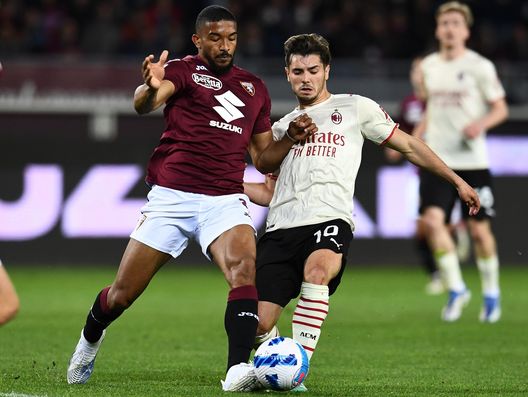 TURIN, ITALY - APRIL 10: Brahim Diaz of AC Milan competes for the ball with Bremer of Torino FC during the Serie A match between Torino FC v AC Milan on April 10, 2022 in Turin, Italy. (Photo by Claudio Villa/AC Milan via Getty Images)