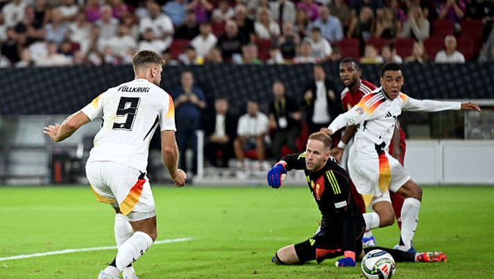 DUESSELDORF, GERMANY - SEPTEMBER 07: Niclas Fullkrug of Germany scores his team's first goal past Peter Gulacsi of Hungary
during the UEFA Nations League 2024/25 League A Group A3 match between Germany and Hungary at Merkur Spiel-Arena on September 07, 2024 in Duesseldorf, Germany. (Photo by Christian Kaspar-Bartke/Getty Images for DFB) niclas-fullkrug-milan-ragioni-mercato-serie-a