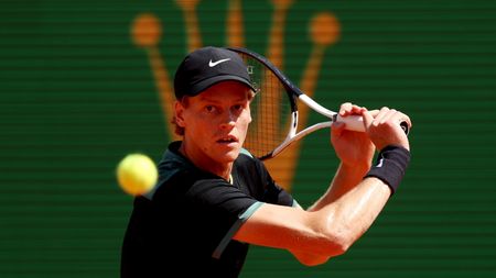 MONTE-CARLO, MONACO - APRIL 13: Jannik Sinner of Italy plays a backhand in the semifinal match against Stefanos Tsitsipas of Greece during day seven of the Rolex Monte-Carlo Masters at Monte-Carlo Country Club on April 13, 2024 in Monte-Carlo, Monaco. (Photo by Julian Finney/Getty Images)