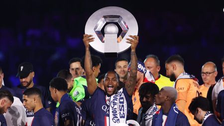 PARIS, FRANCE - JUNE 03: Renato Sanches of Paris Saint-Germain lifts the Ligue 1 Uber Eats trophy after the Ligue 1 match between Paris Saint-Germain and Clermont Foot at Parc des Princes on June 03, 2023 in Paris, France. (Photo by Julian Finney/Getty Images)