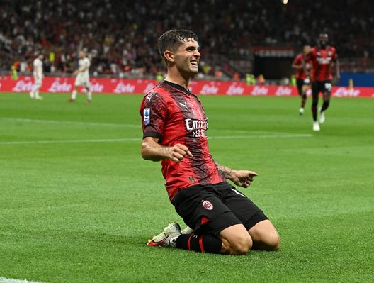 MILAN, ITALY - AUGUST 26: Christian Pulisic of AC Milan celebrates after scoring the opening goal during the Serie A TIM match between AC Milan and Torino FC at Stadio Giuseppe Meazza on August 26, 2023 in Milan, Italy. (Photo by Claudio Villa/AC Milan via Getty Images)