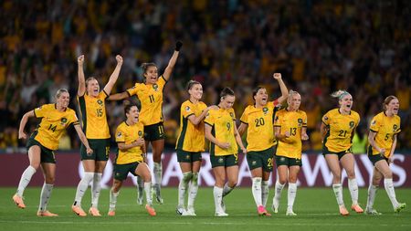 BRISBANE, AUSTRALIA - AUGUST 12: Players of Australia celebrate as Mackenzie Arnold of Australia saves the first penalty of France from Selma Bacha of France in the penalty shoot out during the FIFA Women's World Cup Australia & New Zealand 2023 Quarter Final match between Australia and France at Brisbane Stadium on August 12, 2023 in Brisbane / Meaanjin, Australia. (Photo by Justin Setterfield/Getty Images)