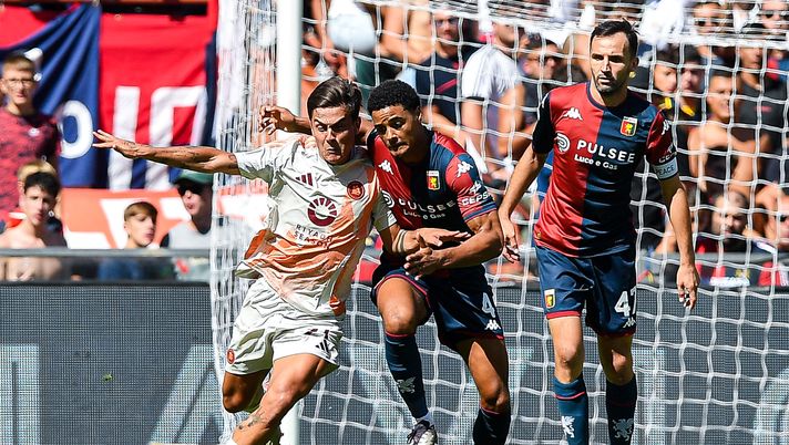 GENOA, ITALY - SEPTEMBER 15: Paulo Dybala of Roma (left) and Koni De Winter of Genoa vie for the ball during the Serie A match between Genoa CFC and AS Roma at Stadio Luigi Ferraris on September 15, 2024 in Genoa, Italy. (Photo by Getty Images/Getty Images) Dovbyk non basta, Roma beffata nel finale: De Winter pareggia allo scadere - immagine 1