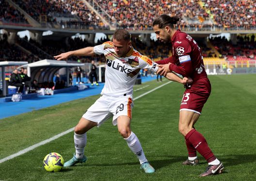 LECCE, ITALY - MARCH 12: Alexis Blin of Lecce competes for the ball with Ricardo Rodriguez of Torino during the Serie A match between US Lecce and Torino FC at Stadio Via del Mare on March 12, 2023 in Lecce, Italy. (Photo by Maurizio Lagana/Getty Images)