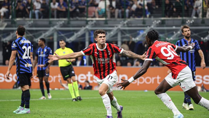 MILAN, ITALY - SEPTEMBER 22: Christian Pulisic of AC Milan celebrates after scoring the opening goal during the Serie A match between FC Internazionale and AC Milan at Stadio Giuseppe Meazza on September 22, 2024 in Milan, Italy. (Photo by Giuseppe Cottini/AC Milan via Getty Images)  pulisic-e-i-gol-pregiati-e-lui-il-rossonero-ad-averne-realizzati-dipiu
