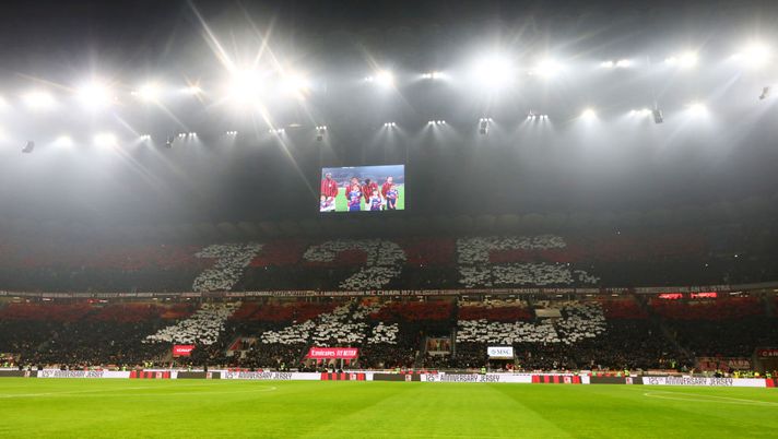 MILAN, ITALY - DECEMBER 15: General view inside the stadium as fans hold placards for AC Milan's 125th Anniversary prior to the Serie A match between AC Milan and Genoa at Stadio Giuseppe Meazza on December 15, 2024 in Milan, Italy. (Photo by Marco Luzzani/Getty Images) Genoa-Milan
