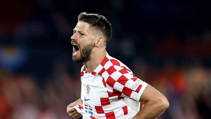 ROTTERDAM, NETHERLANDS - JUNE 14: Bruno Petkovic of Croatia celebrates after scoring the team's third goal during the UEFA Nations League 2022/23 semifinal match between Netherlands and Croatia at De Kuip on June 14, 2023 in Rotterdam, Netherlands. (Photo by Christof Koepsel/Getty Images) Guarente: “Petkovic aveva colpi alla Ibrahimovic. Sarri era una bella opzione” - immagine 1