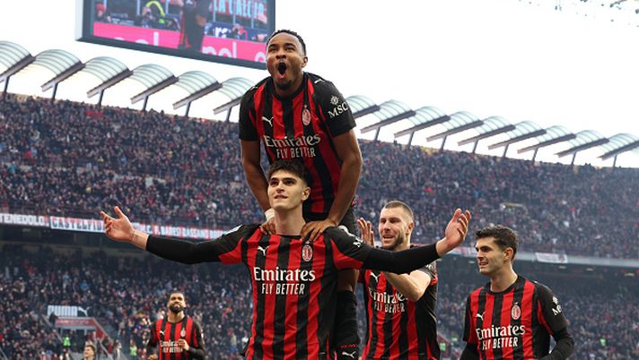 MILAN, ITALY - DECEMBER 14: Davide Bartesaghi of AC Milan celebrates with Christopher Nkunku after scoring the second goal during the Serie A match between AC Milan and US Sassuolo Calcio at Giuseppe Meazza Stadium on December 14, 2025 in Milan, Italy. (Photo by Claudio Villa/AC Milan via Getty Images) sotto-gli-occhi-di-baresi-e-camarda-bartesaghi-come-donnarumma-e-locatelli