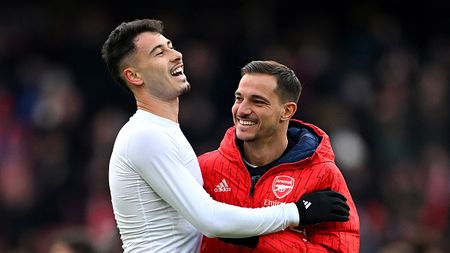 LONDON, ENGLAND - JANUARY 20: Gabriel Martinelli of Arsenal celebrates with teammate Cedric Soares following the team's victory during the Premier League match between Arsenal FC and Crystal Palace at Emirates Stadium on January 20, 2024 in London, England. (Photo by Shaun Botterill/Getty Images)