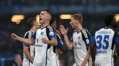 HAMBURG, GERMANY - JULY 28: Laszlo Benes of Hamburger SV celebrates with his teammates after scoring the team's third goal during the Second Bundesliga match between Hamburger SV and FC Schalke 04 at Volksparkstadion on July 28, 2023 in Hamburg, Germany. (Photo by Cathrin Mueller/Getty Images)
