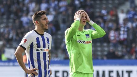 BERLIN, GERMANY - MAY 20: Stevan Jovetic of Hertha BSC and Oliver Christensen react after the Bundesliga match between Hertha BSC and VfL Bochum 1848 at Olympiastadion on May 20, 2023 in Berlin, Germany. (Photo by Maja Hitij/Getty Images)