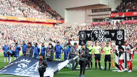LIVERPOOL, ENGLAND - OCTOBER 20: A general view of a 'No Room For Racism' handshake board and flag as players and match officials line up on the pitch prior to the Premier League match between Liverpool FC and Chelsea FC at Anfield on October 20, 2024 in Liverpool, England. (Photo by Carl Recine/Getty Images)
