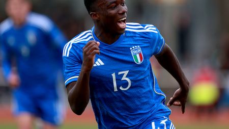 BREMEN, GERMANY - MARCH 22: Michael Olabode Kayode of Italy U19 celebrates after his team mate Niccolò Pisilli (not in the picture) of Italy U19 scored his teams first goal during the UEFA European Under-19 Championship Malta 2023 qualifying match between Germany and Italy at Weserstadion Platz 11 on March 22, 2023 in Bremen, Germany. (Photo by Martin Rose/Getty Images for DFB)