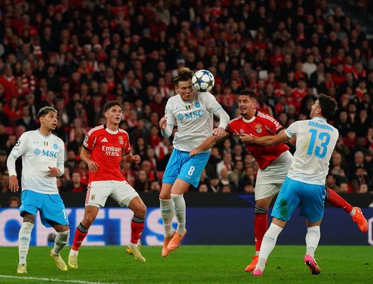 LISBON, PORTUGAL - DECEMBER 10: Scott McTominay of SSC Napoli with Franjo Ivanovic of SL Benfica in action during the UEFA Champions League 2025/26 League Phase MD6 match between SL Benfica and SSC Napoli at Estadio da Luz on December 10, 2025 in Lisbon, Portugal. (Photo by Gualter Fatia/Getty Images)