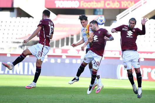 TURIN, ITALY - OCTOBER 28: Nicola Murru (R) of Torino FC clashes with Mariusz Stepinski of US Lecce during the Coppa Italia match between Torino FC and US Lecce at Stadio Olimpico Grande Torino on October 28, 2020 in Turin, Italy. (Photo by Valerio Pennicino/Getty Images)