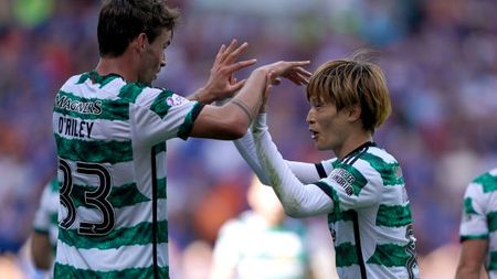 Celtic's Kyogo Furuhashi (right) celebrates with Matt O'Riley after scoring their side's first goal of the game during the cinch Premiership match at the Ibrox Stadium, Glasgow. Picture date: Sunday September 3, 2023. (Photo by Andrew Milligan/PA Images via Getty Images)