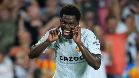 VALENCIA, SPAIN - AUGUST 29: Yunus Musah of Valencia CF celebrates after scoring a goal that was later disallowed following a VAR review during the LaLiga Santander match between Valencia CF and Atletico de Madrid at Estadio Mestalla on August 29, 2022 in Valencia, Spain. (Photo by Aitor Alcalde/Getty Images)