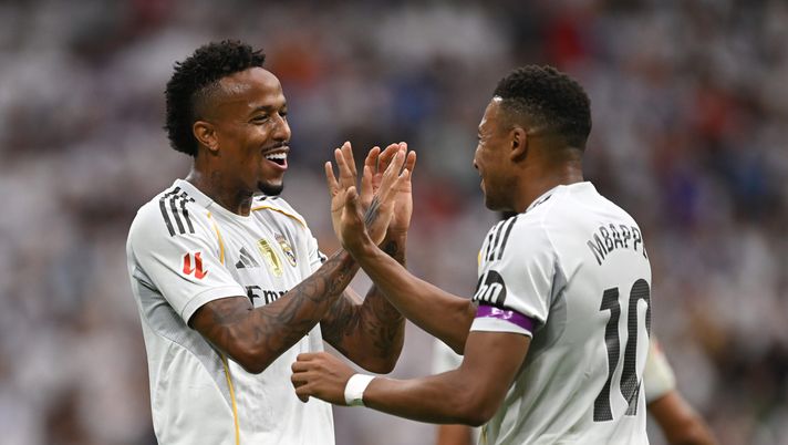 MADRID, SPAIN - SEPTEMBER 20: Eder Militao of Real Madrid celebrates scoring his team's first goal with teammate Kylian Mbappe during the LaLiga EA Sports match between Real Madrid CF and RCD Espanyol de Barcelona at Estadio Santiago Bernabeu on September 20, 2025 in Madrid, Spain. (Photo by Denis Doyle/Getty Images) Liga, Levante-Real Madrid: diretta tv e streaming LIVE del match - immagine 1